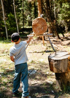 Warming up with throwing axes for the Marksmanship program at Siwash Lake Wilderness Resort
