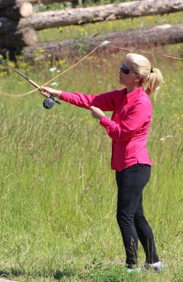 Casting lessons at Siwash Lake fish pond